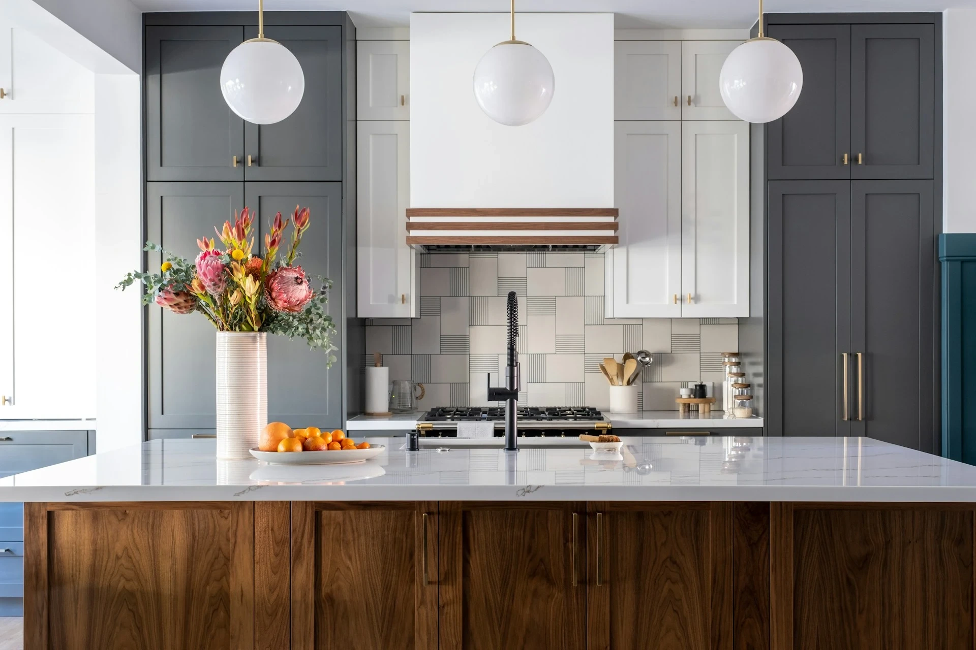 Modern kitchen workspace with cookware and preparation area